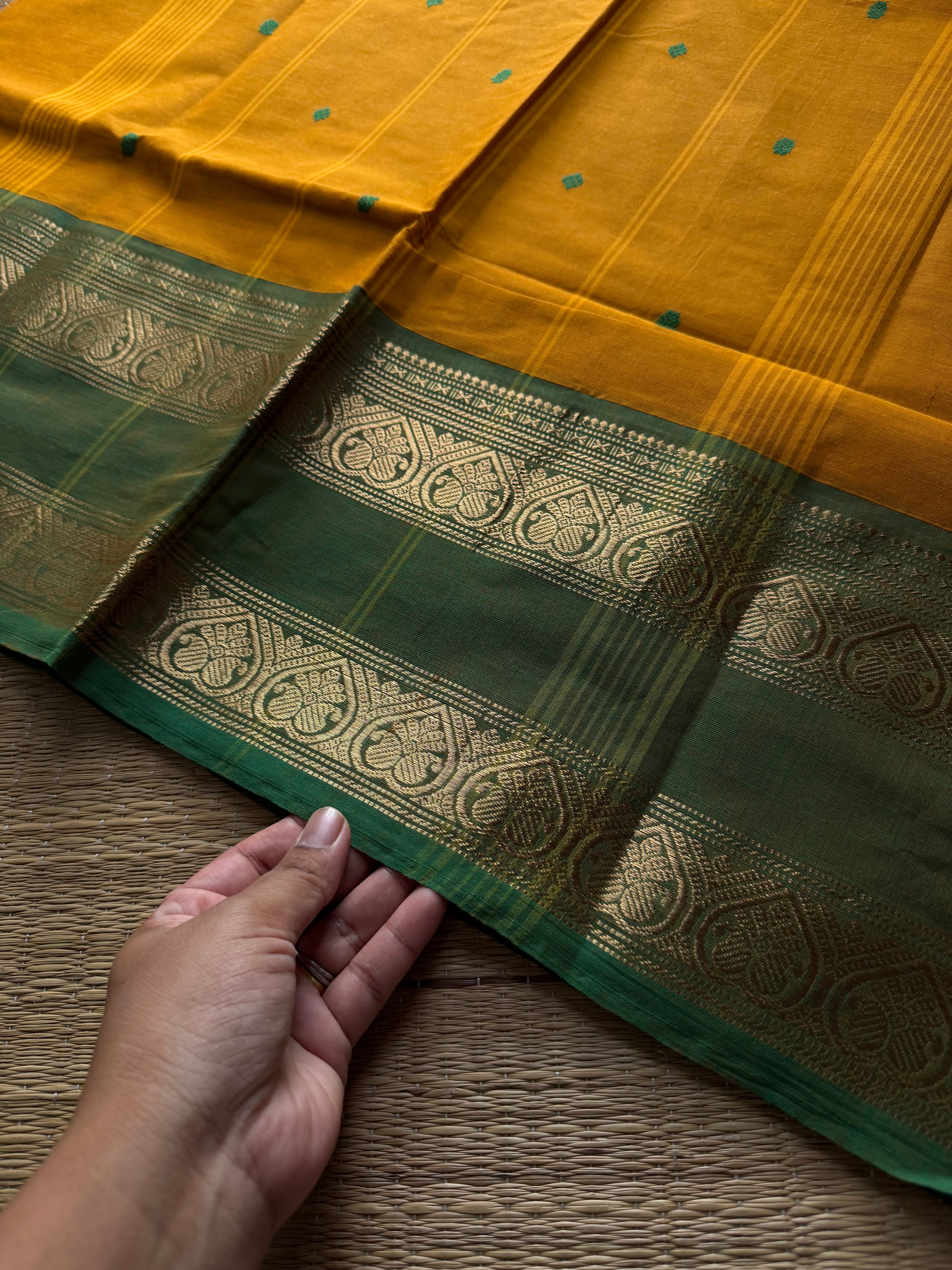 Yellow with green combination Kanchi cotton saree with handmade thread buttas