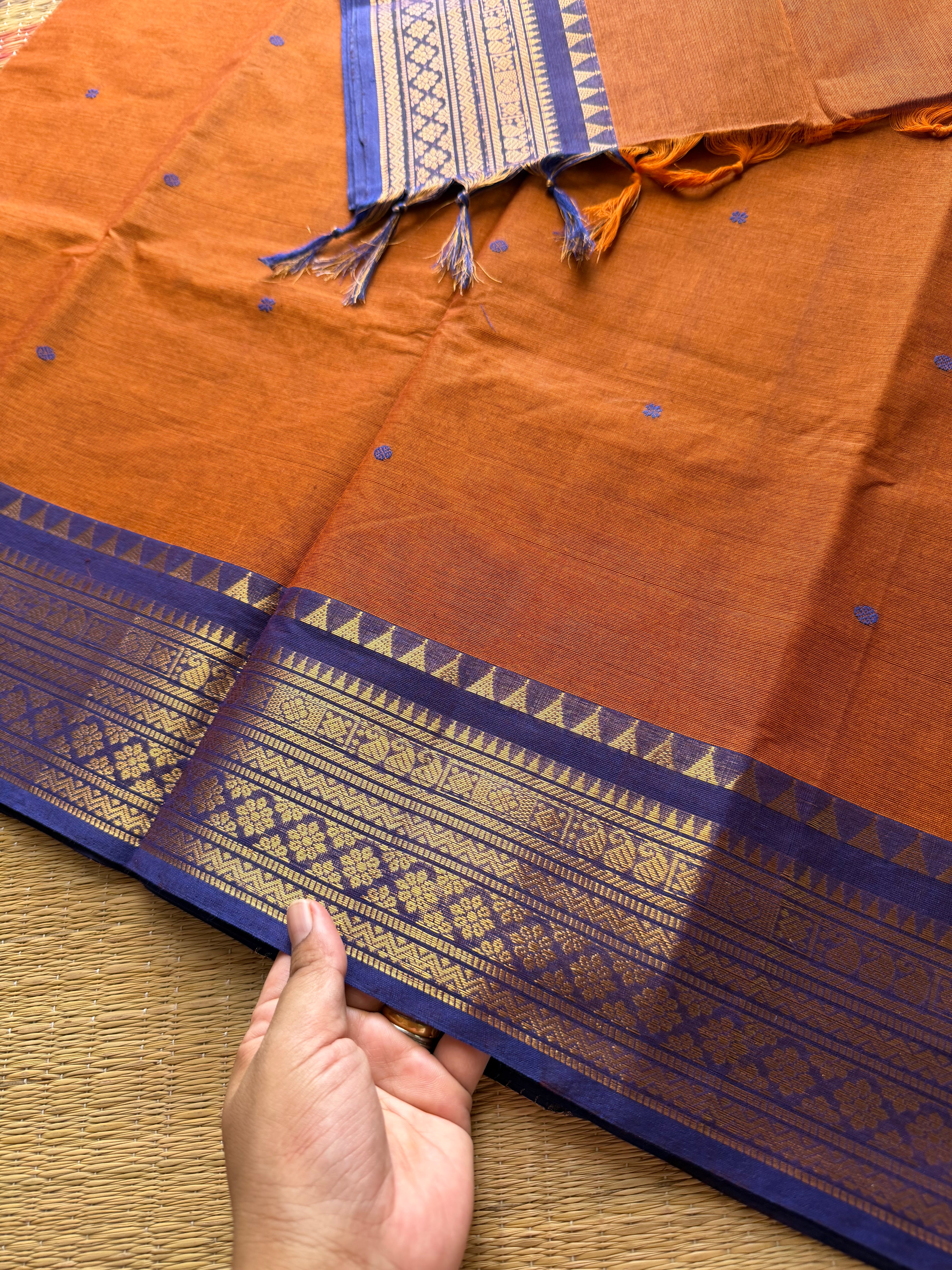 Orange with royal blue combination Kanchi cotton saree with handmade thread buttas