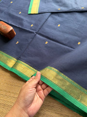 Navy blue with green combination small border Kanchi cotton saree with handmade golden Zari Buttas