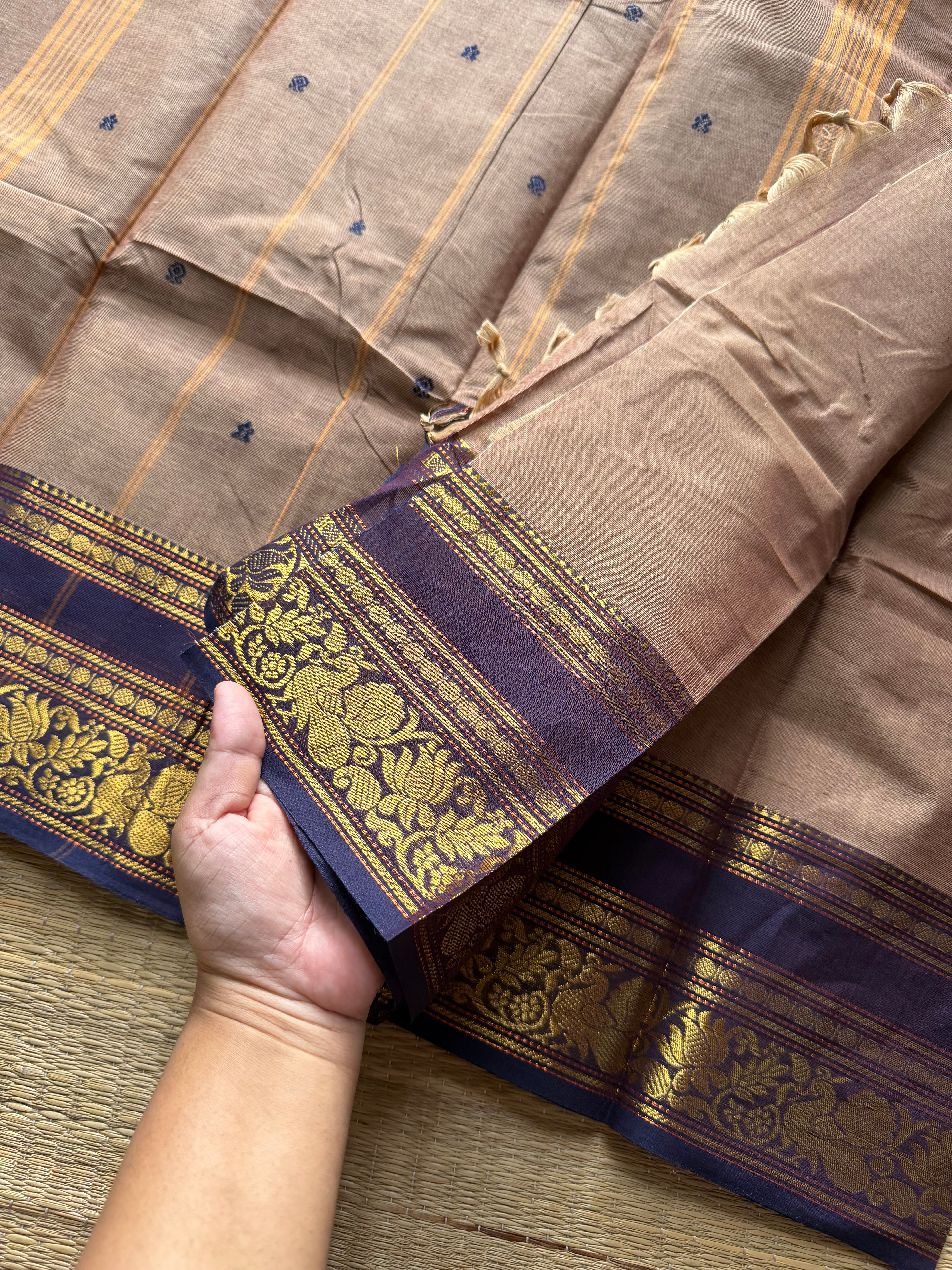Dual tone biscuit shade Kanchi cotton saree with Annam & lotus pattern contrast border and handmade thread buttas