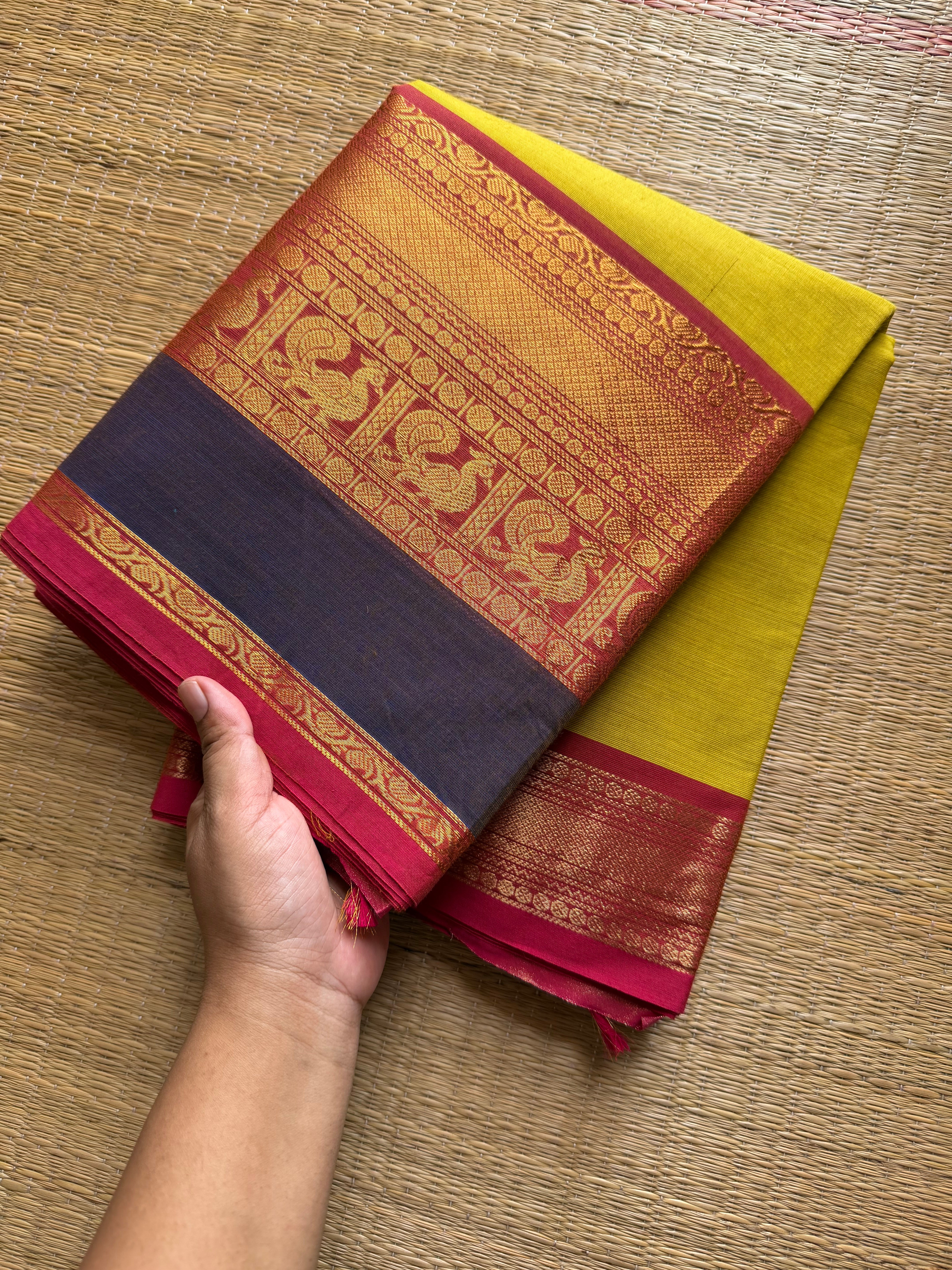 Mustard yellow shade Kanchi cotton saree with contrast big Zari border