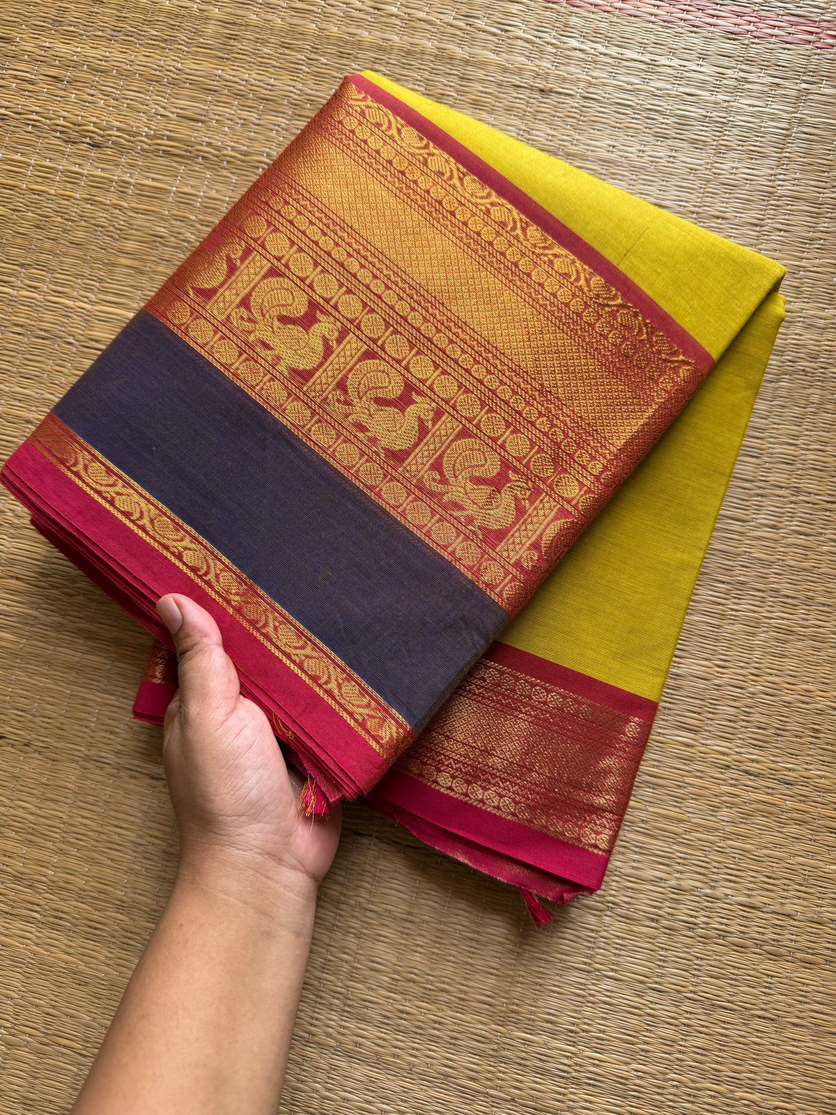 Mustard yellow shade Kanchi cotton saree with contrast big Zari border