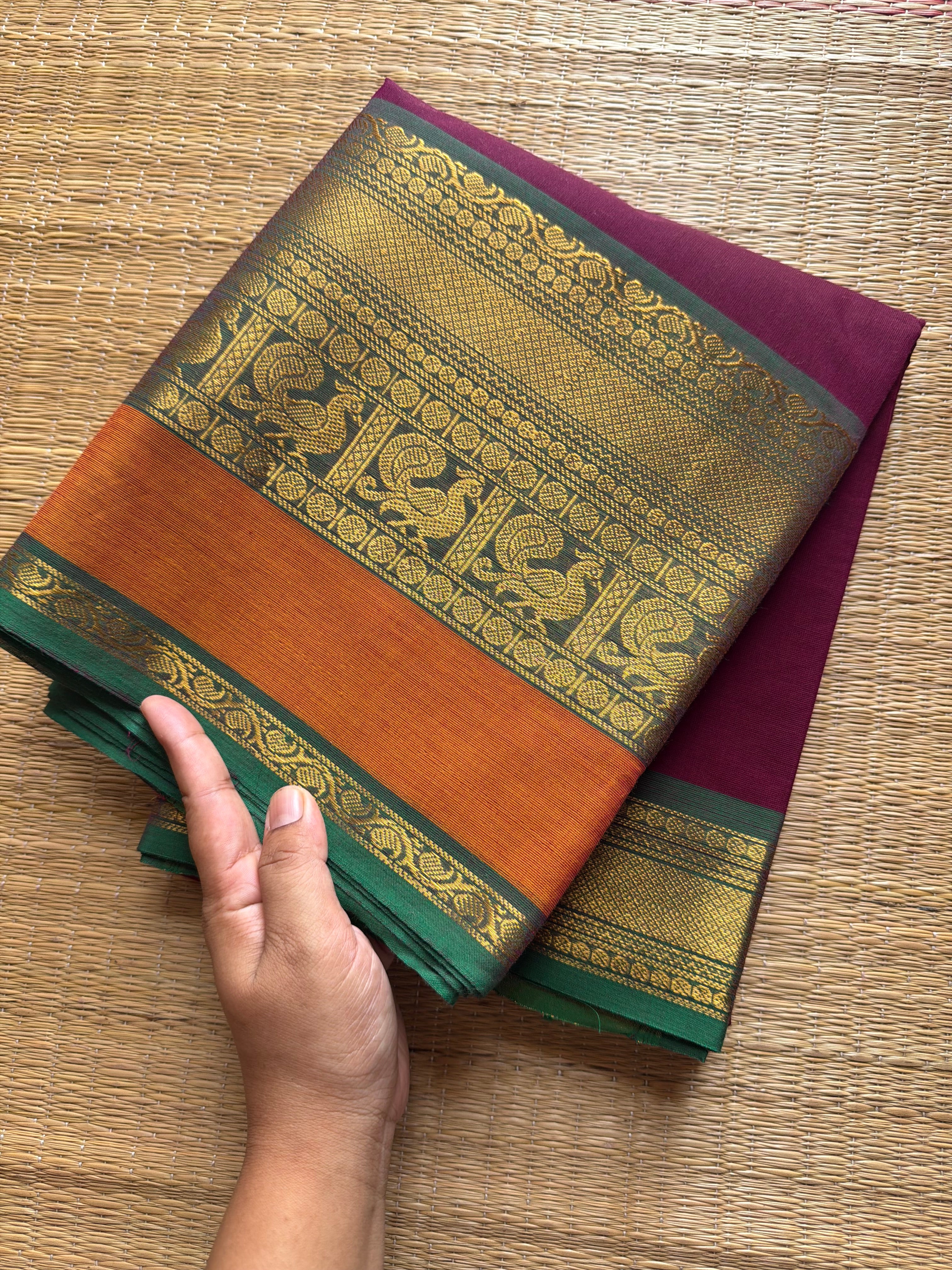 Dark magenta pink shade Kanchi cotton saree with contrast big Zari border