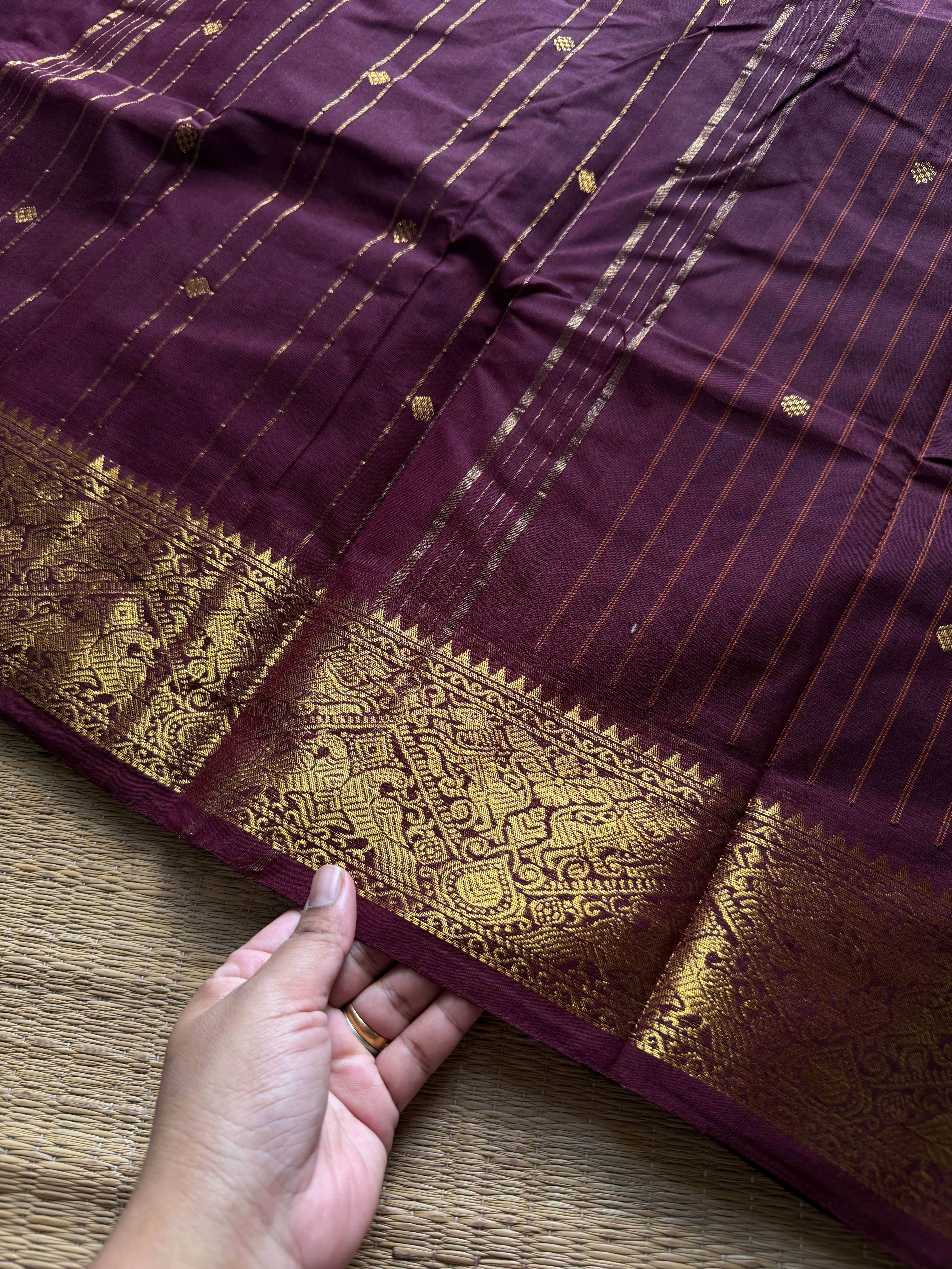 RF1410 Monotone deep maroon ~ Vanasingaram border Kanchi cotton saree with handmade thread buttas