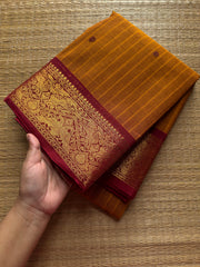 RF536 Dual tone orange with contrast maroon combination Kanchi cotton saree with Vanasingaram border and handmade thread buttas