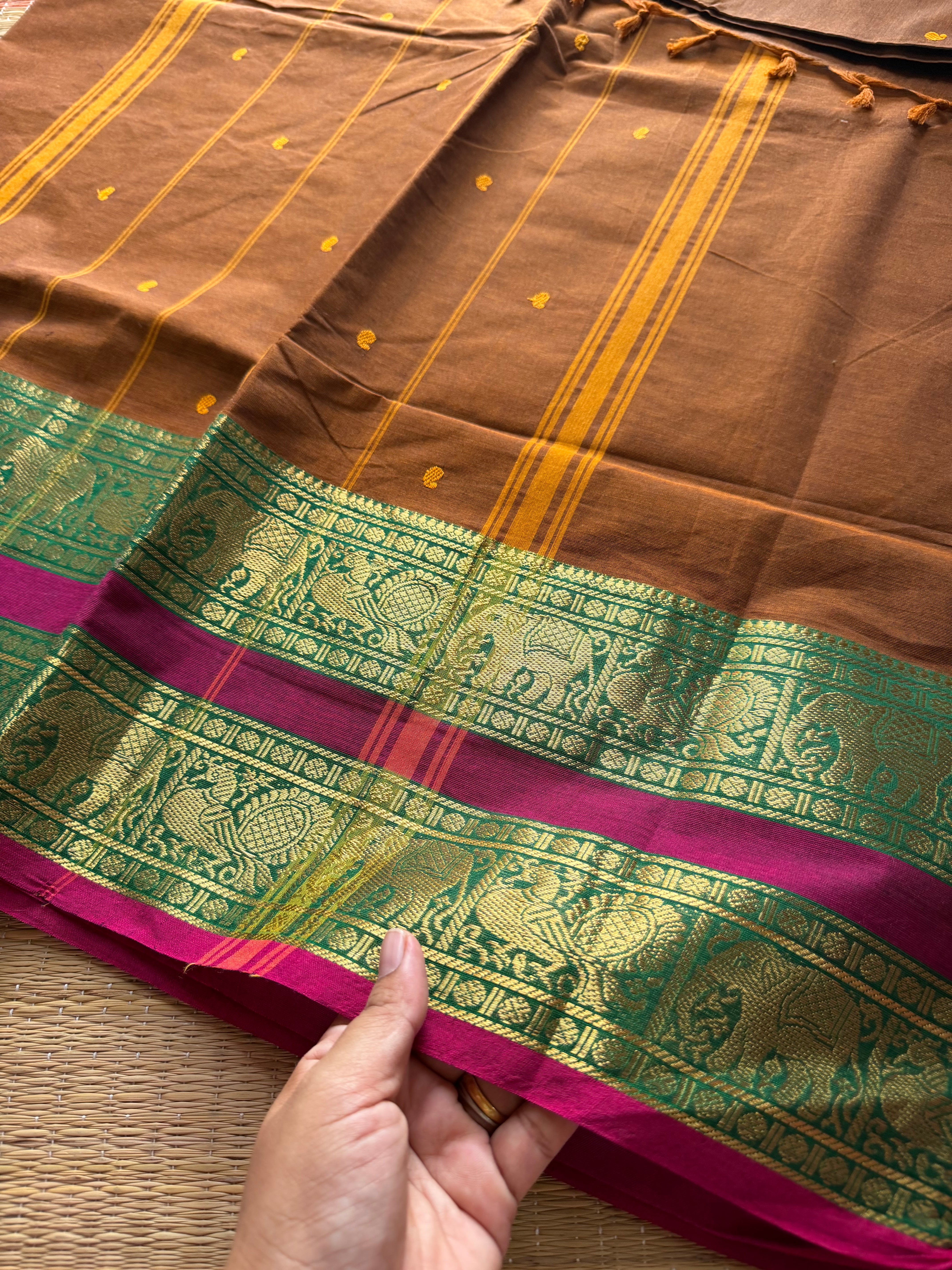 RF252 Dark Honey shade with contrast green and pink combination Rettapet border Kanchi cotton saree with handmade thread buttas