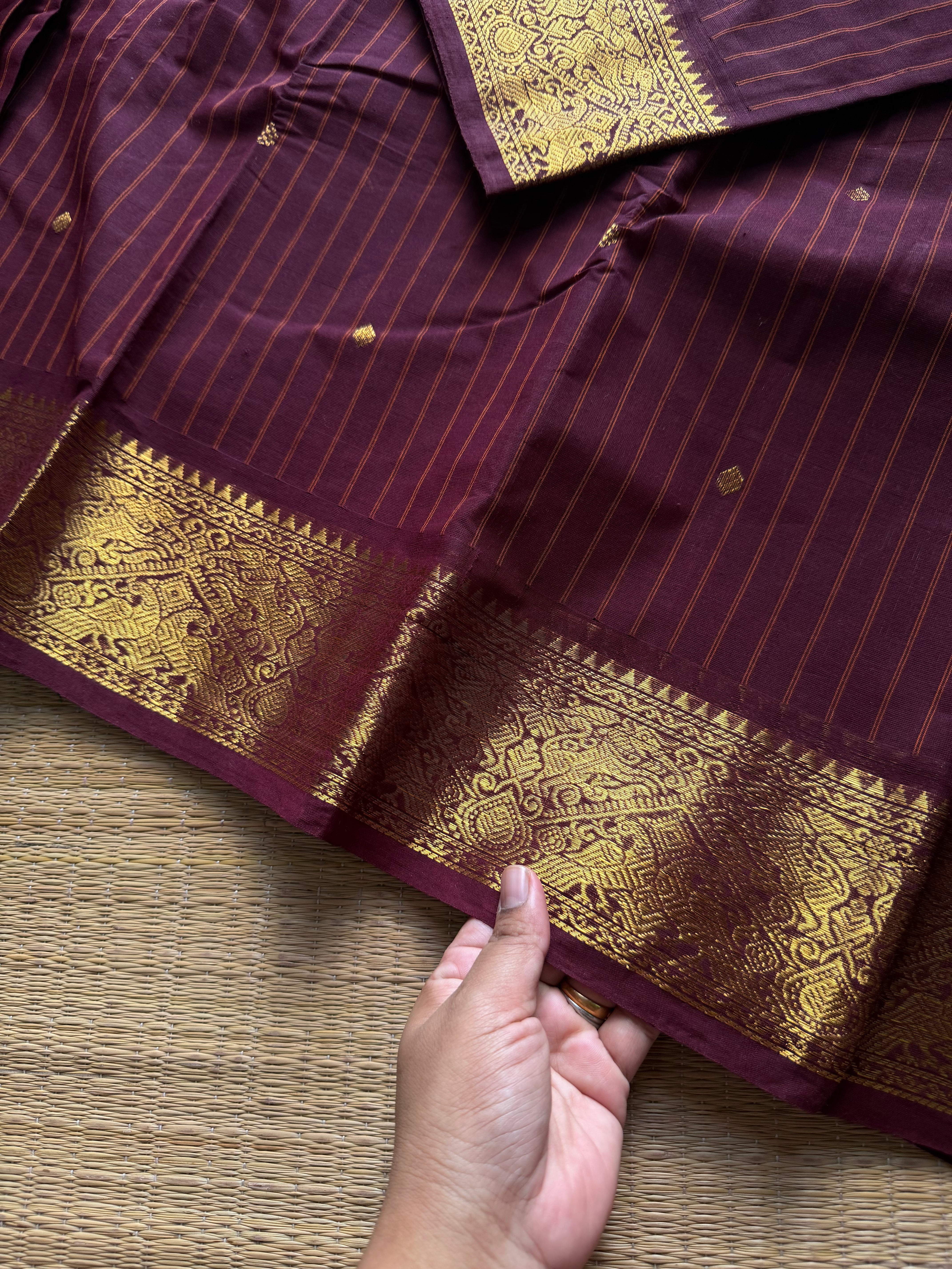 RF1410 Monotone deep maroon ~ Vanasingaram border Kanchi cotton saree with handmade thread buttas