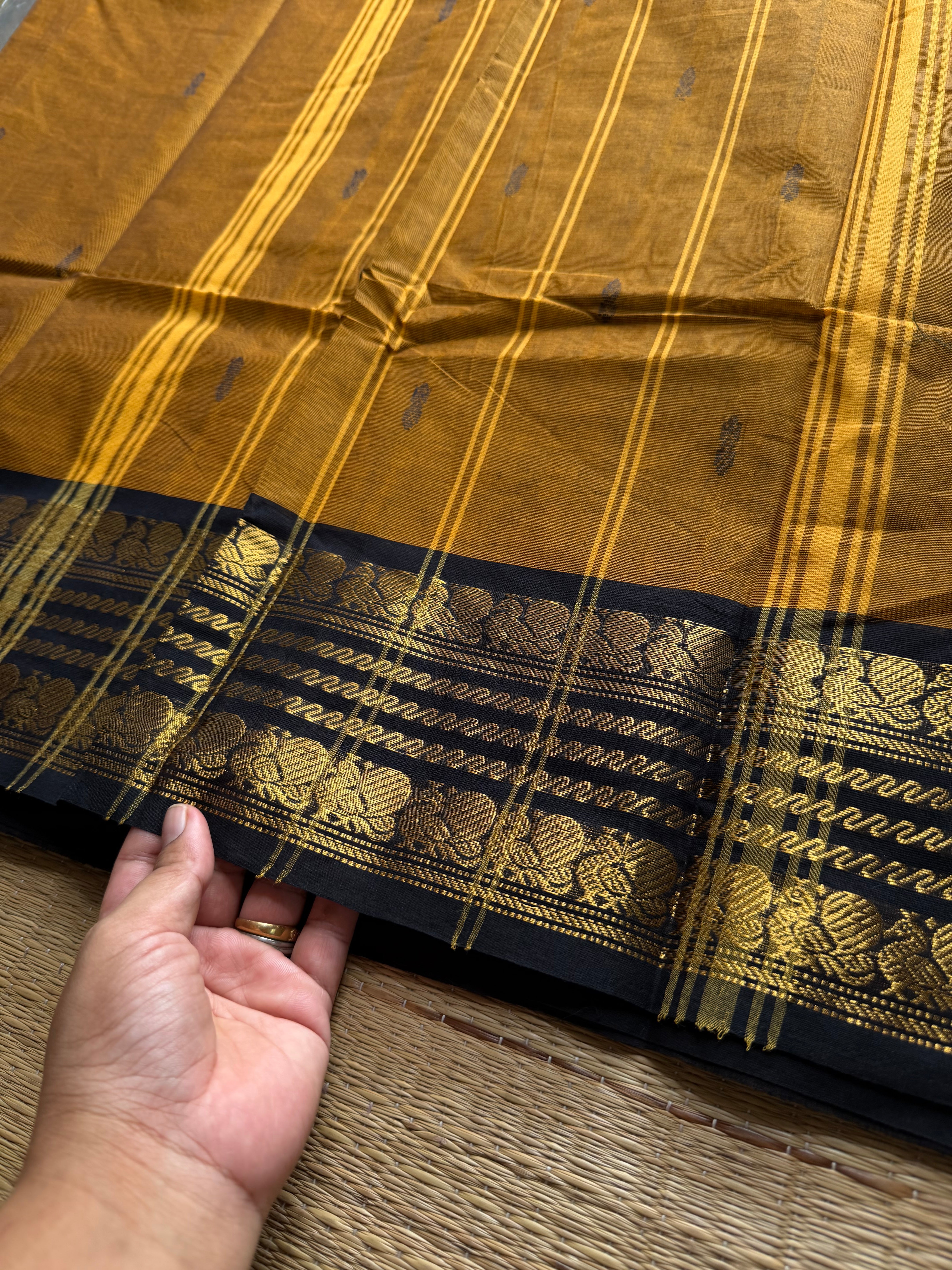 RF547 Mustard with black combination Kanchi cotton saree with handmade thread buttas