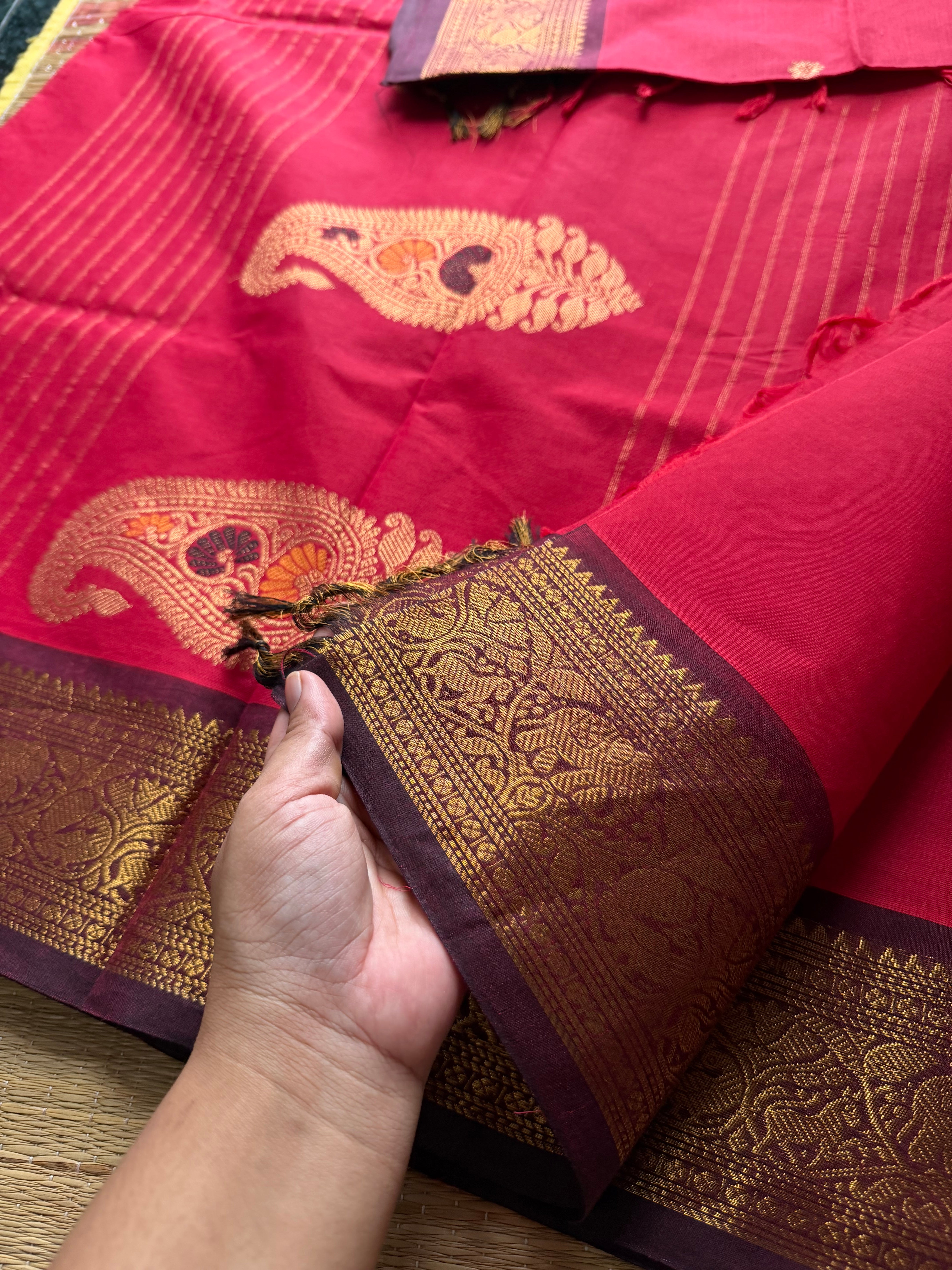 Premium Kanchi Cotton Saree : Reddish maroon with brown combination Kanchi Cotton Saree With Unique Vanasingaram Border and simple zari woven mango Motif Pallu