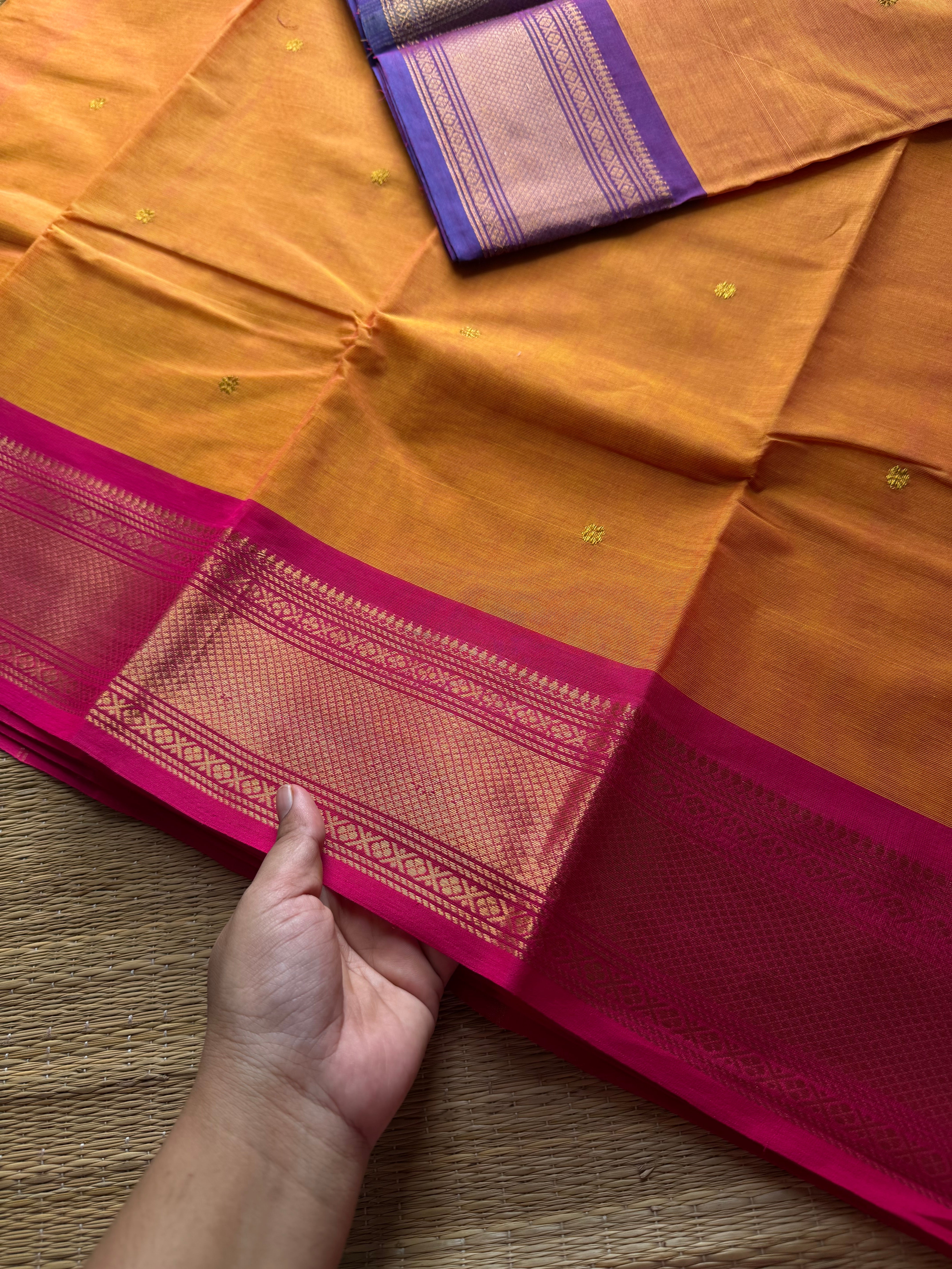 Dark Mango shade with contrast purple & pink combo Ganga Jamuna border Kanchi cotton saree with handmade thread buttas