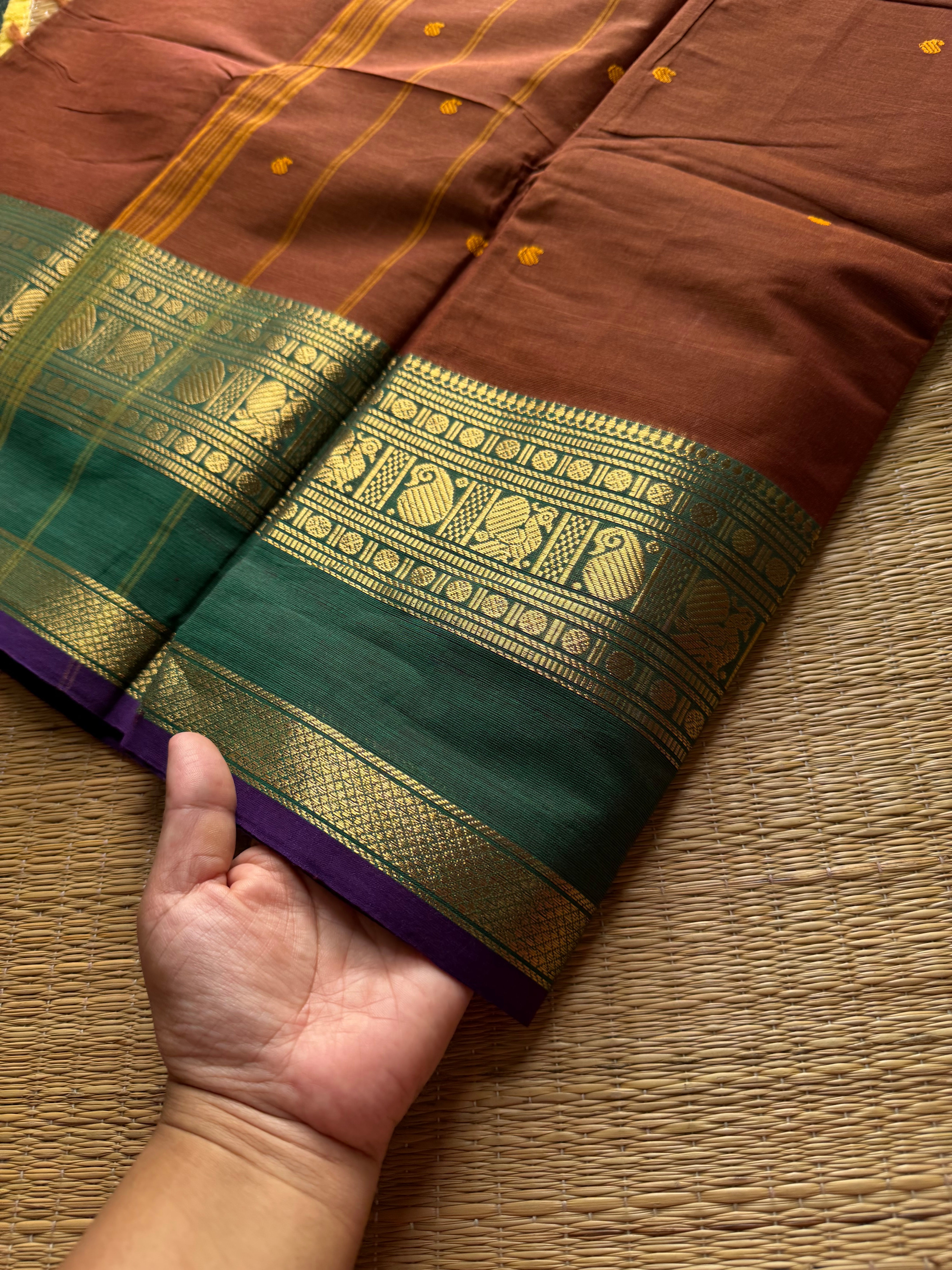 RF513 Honey shade with contrast green and purple combination Kanchi cotton saree with handmade thread buttas