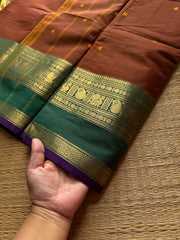RF513 Honey shade with contrast green and purple combination Kanchi cotton saree with handmade thread buttas