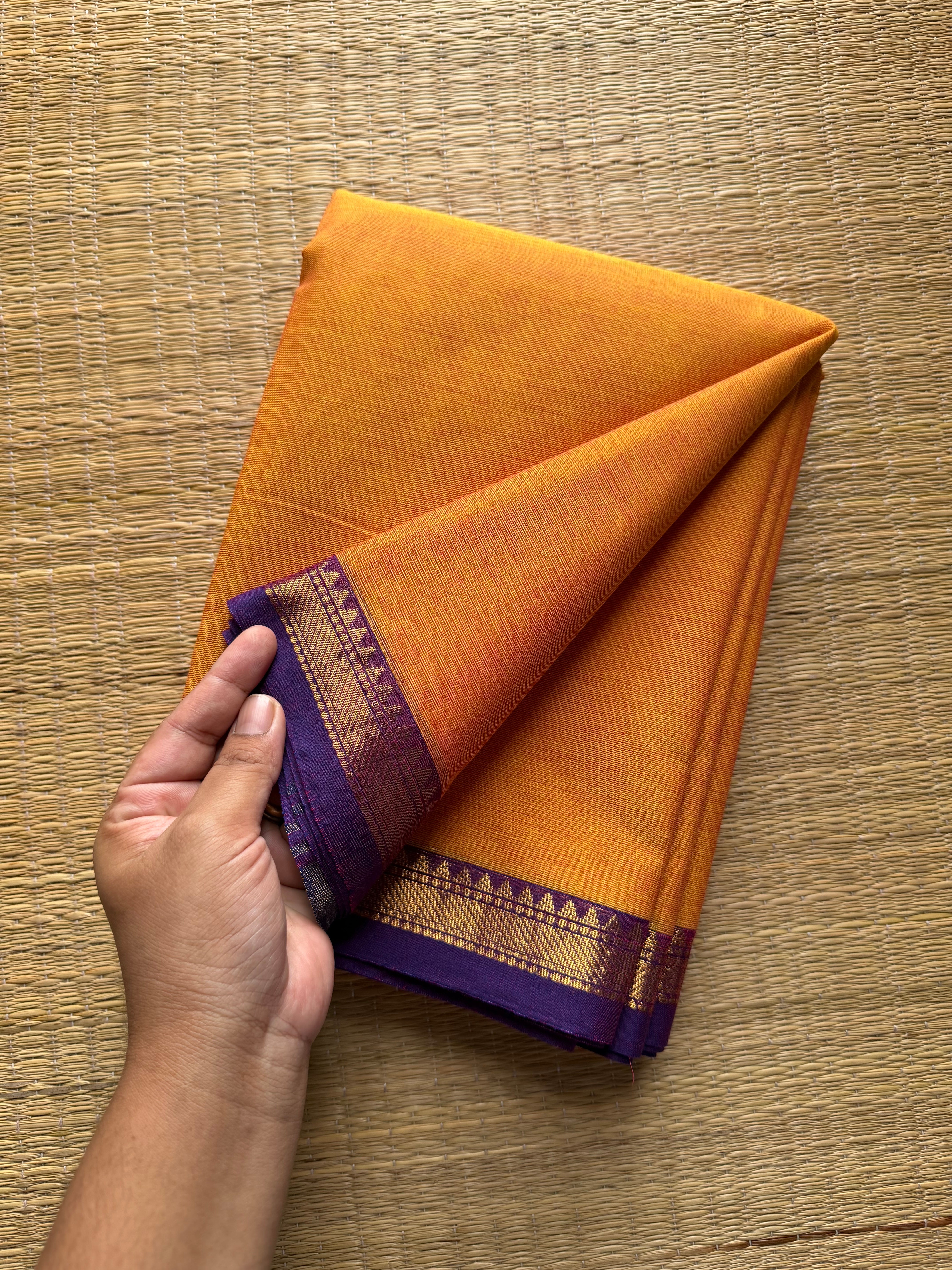 RF204 Dark Mango shade with contrast small purple shade Zari border Kanchi cotton saree