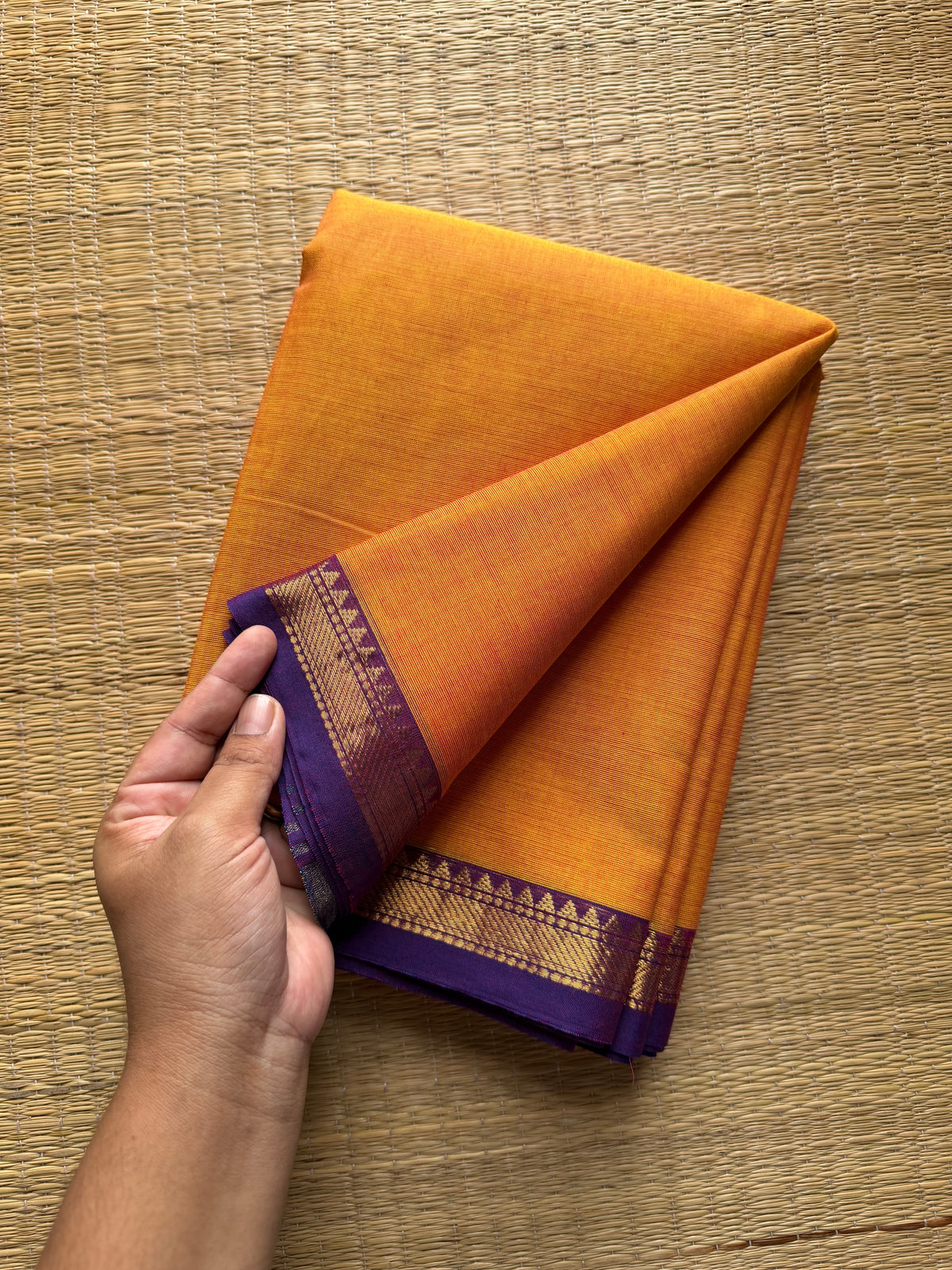 RF204 Dark Mango shade with contrast small purple shade Zari border Kanchi cotton saree