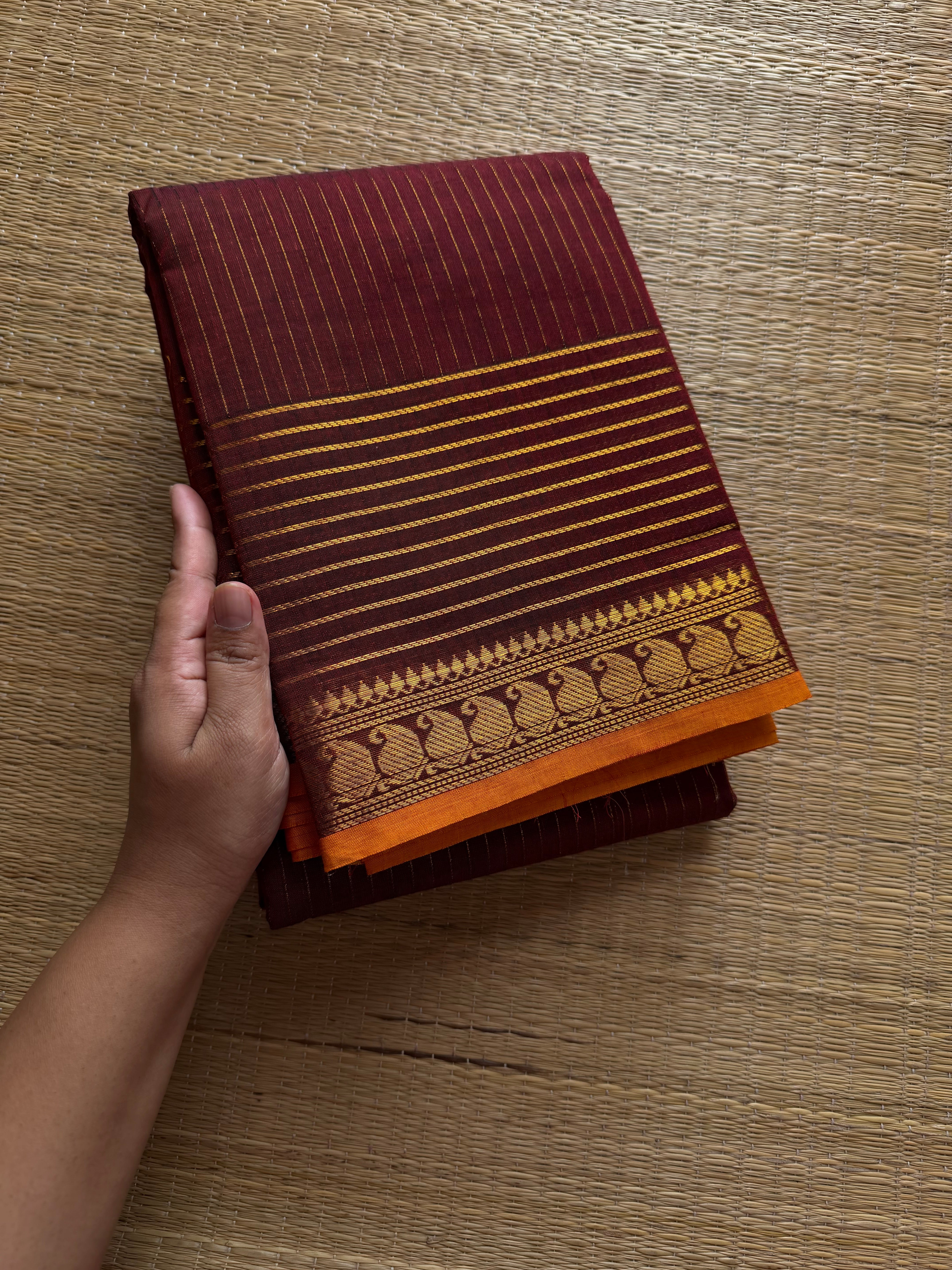 RF492 Maroon shade fully Vaira Oosi pattern Kanchi cotton saree with contrast small orange mango pattern border