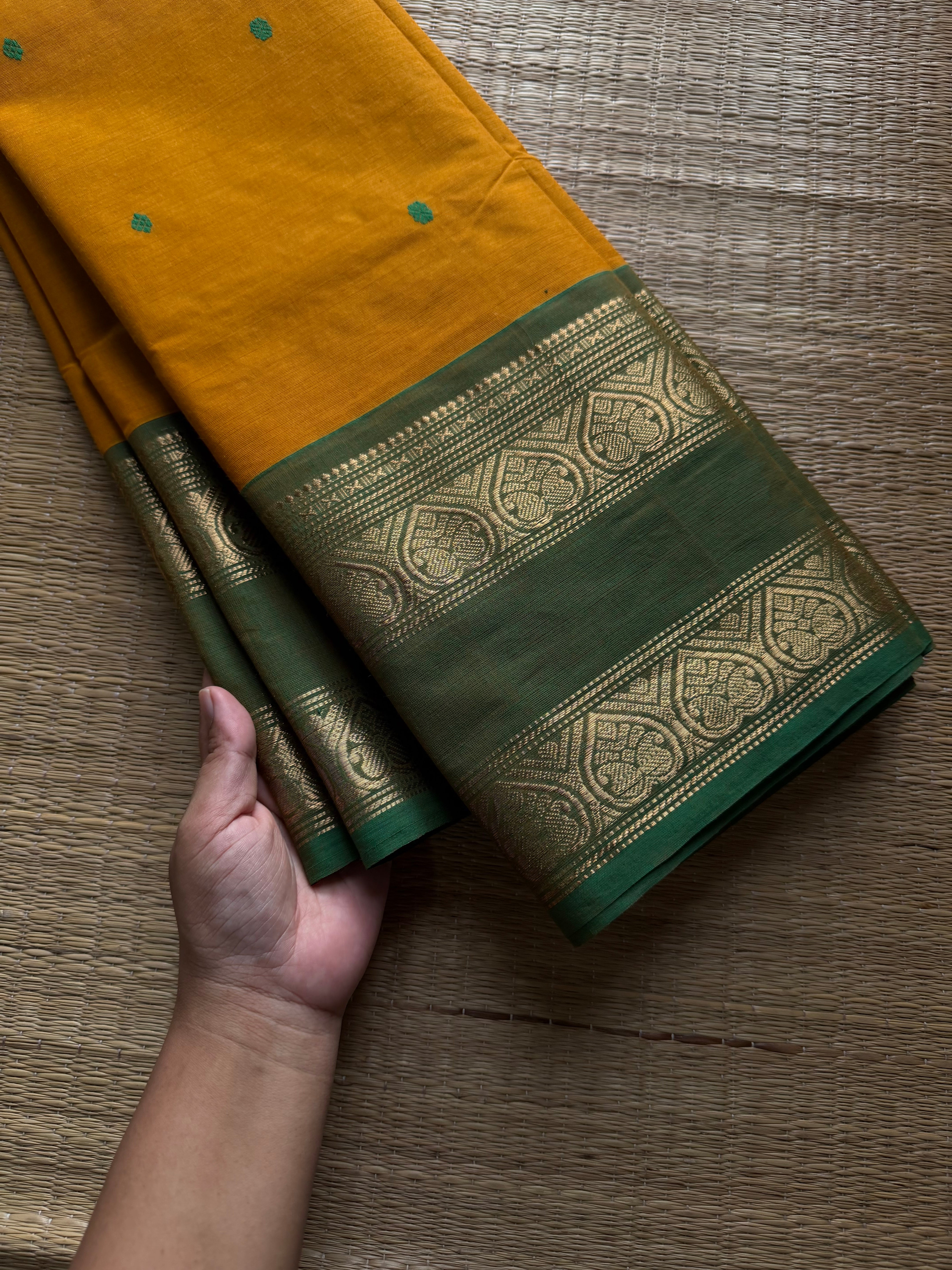 Yellow with green combination Kanchi cotton saree with handmade thread buttas