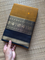RF288 Mustard with black combination Kanchi cotton saree with Rettapet border and handmade thread buttas