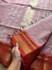RF189 Peach shade with contrast orange medium size border Kanchi cotton saree