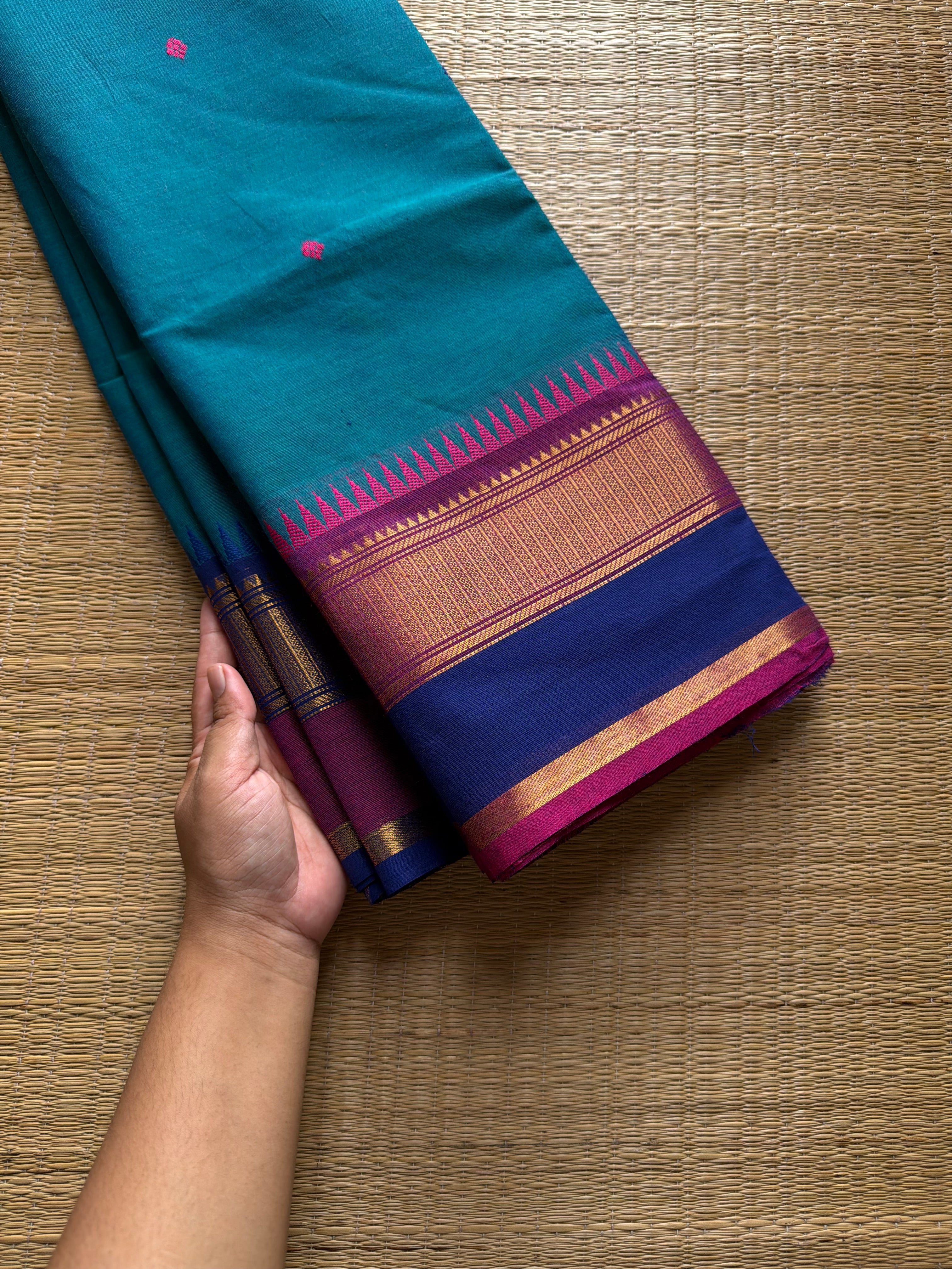 RF740 Peacock blue shade Kanchi cotton saree with Ganga Jamuna border and handmade thread buttas