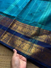 RF700 Peacock blue shade Kanchi cotton saree with Rettapet border & handmade thread buttas