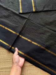 Monotone black shade Kanchi cotton saree with vintage gap border and fully golden Vairaoosi pattern