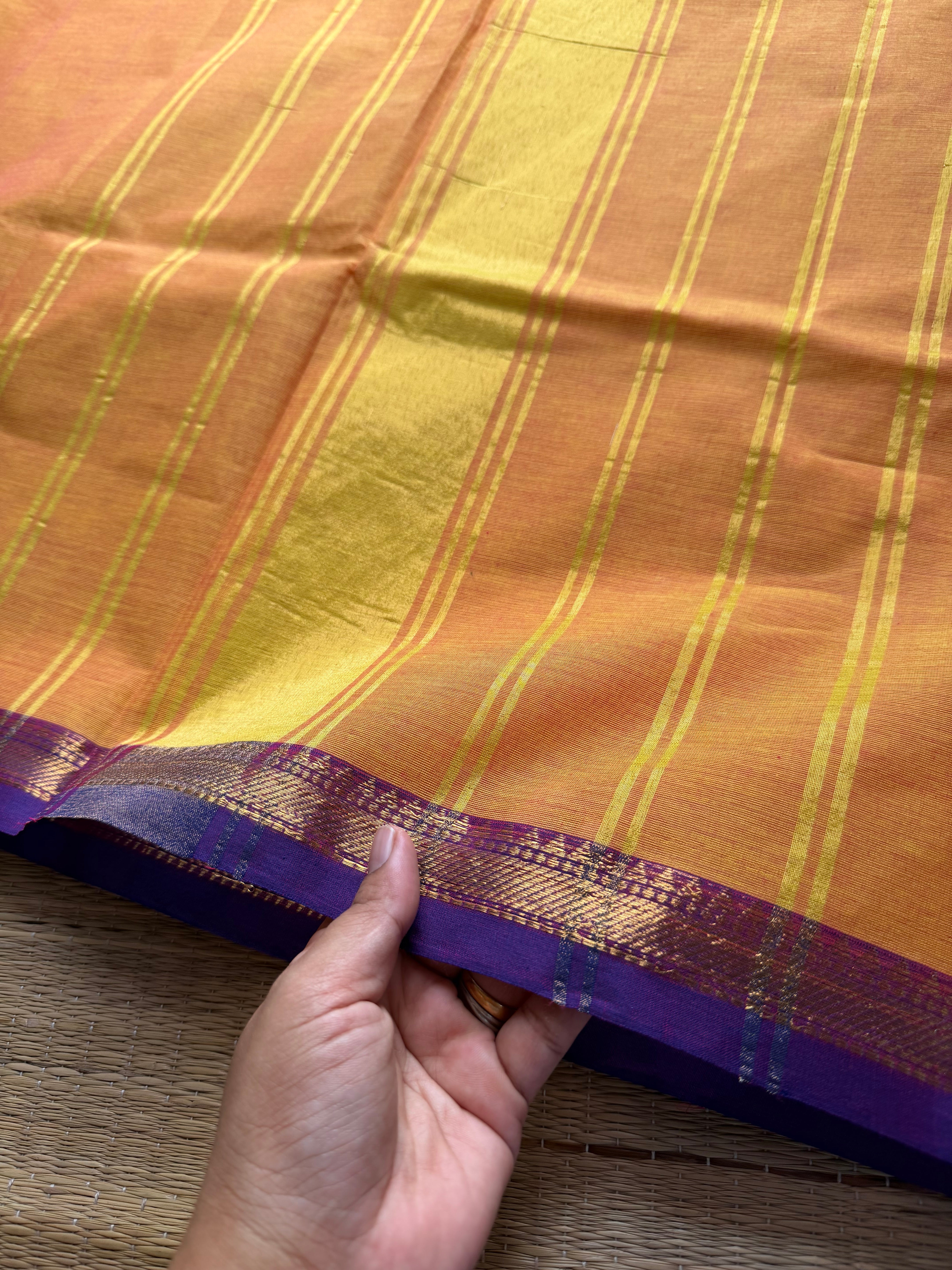 RF204 Dark Mango shade with contrast small purple shade Zari border Kanchi cotton saree
